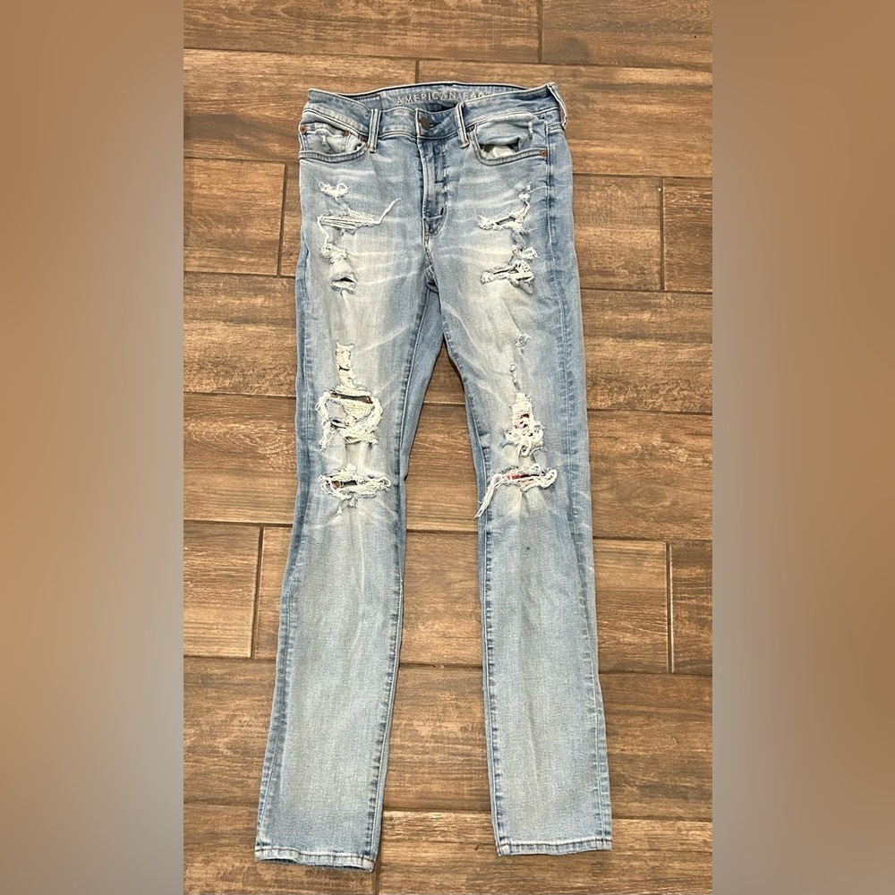 Distressed light blue American eagle jeans